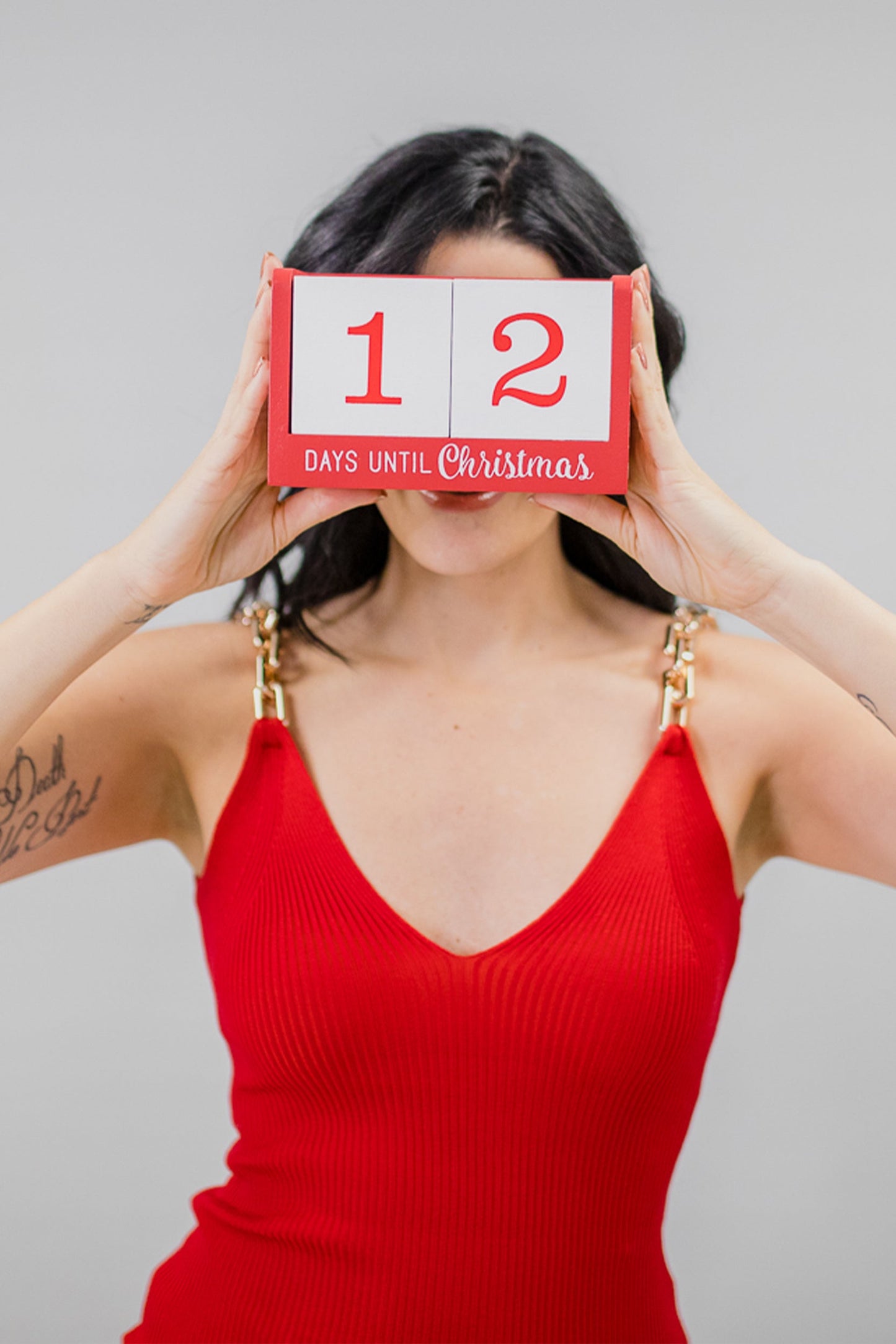 Whips and Chains Plunge Neck Ribbed Mini Dress